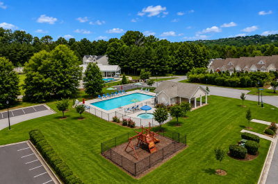 Sunny Suburban Pool and Playground Community Cottages